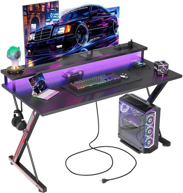 Main image of Gaming Desk with Power Outlets & LED 40 Inch Ergonomic Computer Carbon Fiber Surface Gamer Desk, Large Monitor Stand, Headphone Hook, PC Workstation for Bedroom, Black