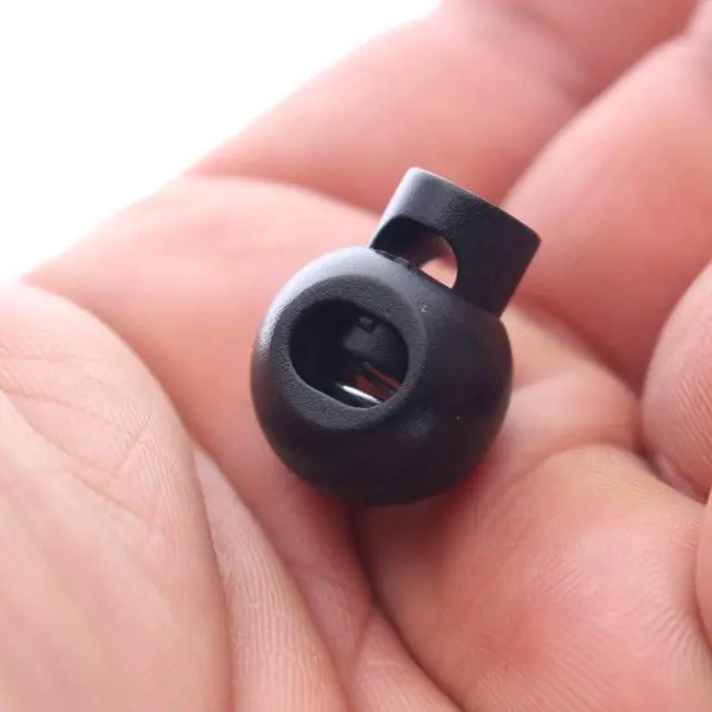 Alt view image 2 of 7 - Premium Single Hole Cord Locks - Small Round Plastic Pop Toggle Bead with Spring Lock
