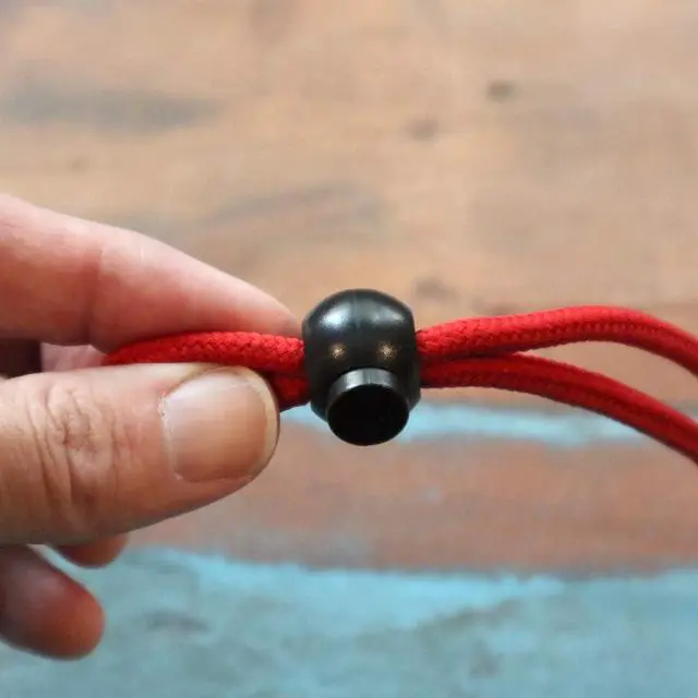 Alt view image 5 of 7 - Premium Single Hole Cord Locks - Small Round Plastic Pop Toggle Bead with Spring Lock