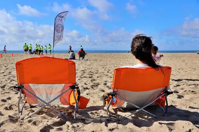 Alt view image 6 of 6 - Low Beach Camping Folding Chair, Compact Backpacking River Sand Chair,Sillas De Playa, with Cup Holder, Carry Bag, Heavy Duty Outdoor, Camping, Beach, Travel, Picnic, Festival (2 Pack Orange)