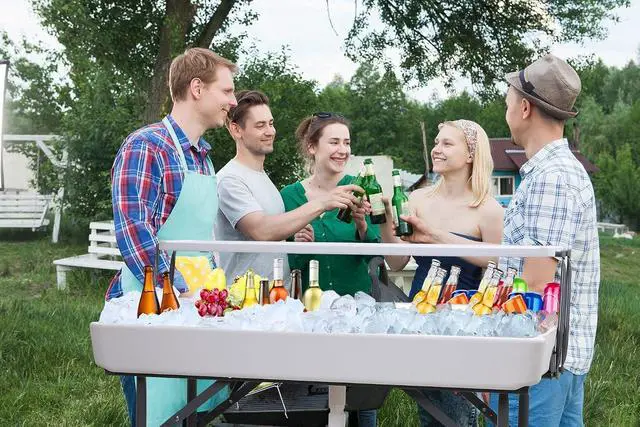 Alt view image 5 of 6 - 4 ft Folding Ice Cooler Table, Party Cooler, Grazing Table, Tables with Drain, Bar Cooler Tables, with Matching Skirt, Storage Shelf (White)