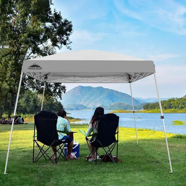 Alt view image 6 of 7 - 10x10 Slant Leg Outside Pop Up Canopy, Instant Outdoor Canopy Tent, 8x8 Top 10x10 Base Sun Shelter with Wheeled Carry Bag, Ropes and Stakes, White