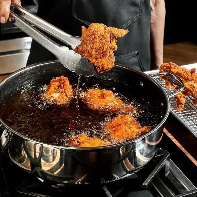 Alt view image 2 of 7 - HexClad Hybrid Nonstick 7-Quart Sauté Pan with Tempered Glass Lid, Chicken Fryer, Stay-Cool Handles, Dishwasher-Friendly, Oven-Safe Up to 900°F, Induction Ready, Compatible with All Cooktops