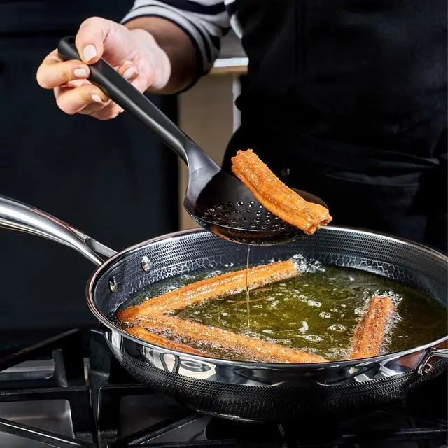 Alt view image 7 of 7 - HexClad 9-Piece Kitchen Utensil Set, 9 Stainless Steel & Silicone Tools with a Fingerprint-Resistant Metallic Finish, Heat-Resistant to 450°F, Dishwasher-Safe, Includes Non-Slip Ceramic Crock Holder