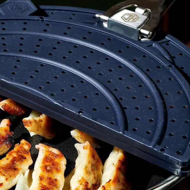Alt view image 5 of 6 - Grease Splatter Screen for Frying and Searing, Fits 10 and 12-inch Pans, Dishwasher-Safe, Folding Design, Heat-Safe to 480°F, Stay-Cool Locking Handle, Silicone and Stainless Steel
