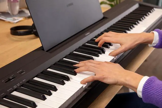 Alt view image 6 of 7 - Yamaha 88-Key Digital Piano with Weighted Keys, Compact Design, Bluetooth, Keyboard, Music Rest, Sustain Foot Switch, and Built-in Speakers for Home Practice or Travel P145BT