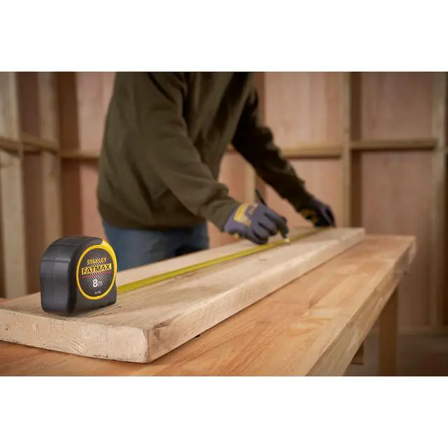 Alt view image 3 of 7 - STANLEY Tape Measure Blade Armor 8 M Metric Shock Resistant with Mylar Coating and Cushion Grip 0-33-728