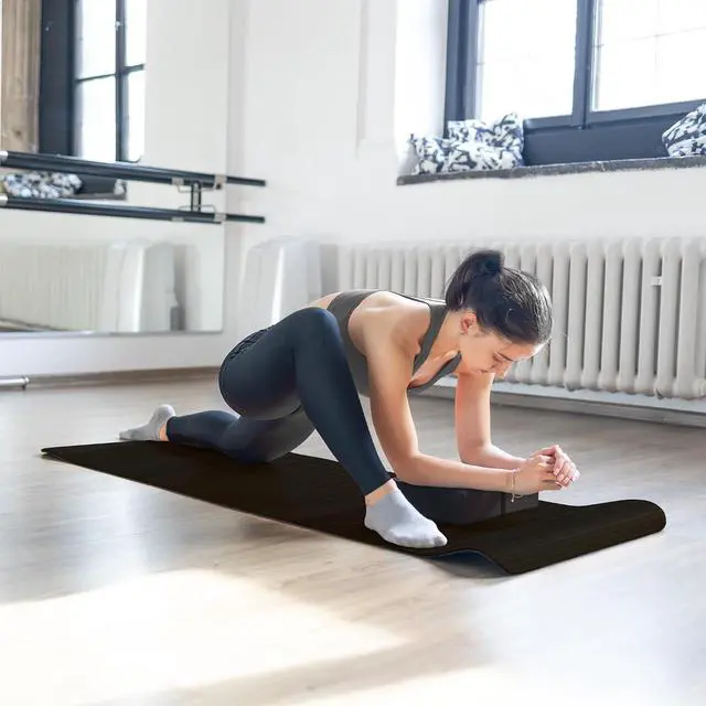 Alt view image 5 of 7 - BalanceFrom 7-Piece Yoga Set with 71x24x0.5 Inches Extra Thick Mat and Carrying Sling Includes 2 Blocks, Stretch Strap, 2 Towels, and Knee Pad for Home, Studio, and Gym Workouts