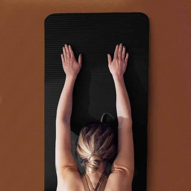 Alt view image 6 of 7 - BalanceFrom 7-Piece Yoga Set with 71x24x0.5 Inches Extra Thick Mat and Carrying Sling Includes 2 Blocks, Stretch Strap, 2 Towels, and Knee Pad for Home, Studio, and Gym Workouts