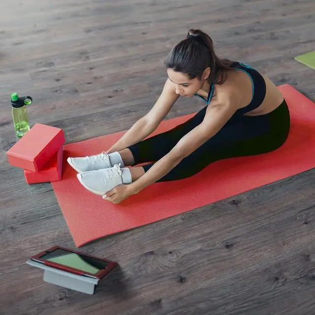 Alt view image 6 of 7 - BalanceFrom 7-Piece Yoga Set with 71x24x0.5 Inches Extra Thick Mat and Carrying Sling Includes 2 Blocks, Stretch Strap, 2 Towels, and Knee Pad for Home, Studio, and Gym Workouts