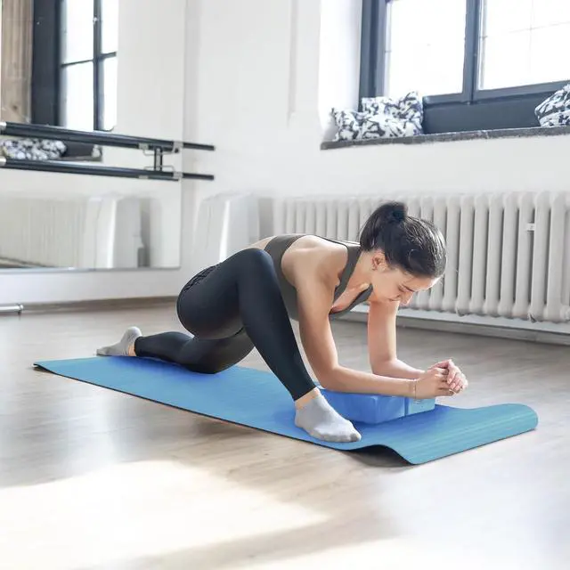 Alt view image 5 of 7 - BalanceFrom 7-Piece Yoga Set with 71x24x0.5 Inches Extra Thick Mat and Carrying Sling Includes 2 Blocks, Stretch Strap, 2 Towels, and Knee Pad for Home, Studio, and Gym Workouts
