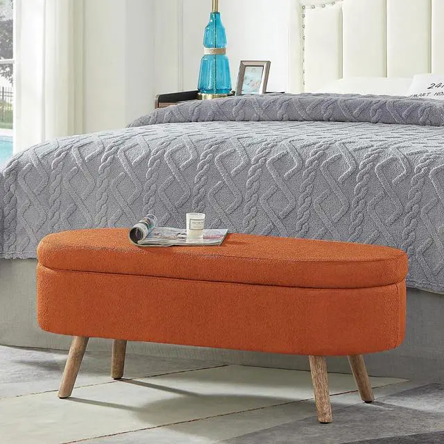 Alt view image 3 of 6 - Boucle Upholstered Storage Bench with Wood Legs, 42.25" Oval Shaped End of Bed Bench with Safety Hinge, 350lb Weight Capacity, Luxury Ottoman Foot Stool for Living Room, Bedroom Entryway, Orange