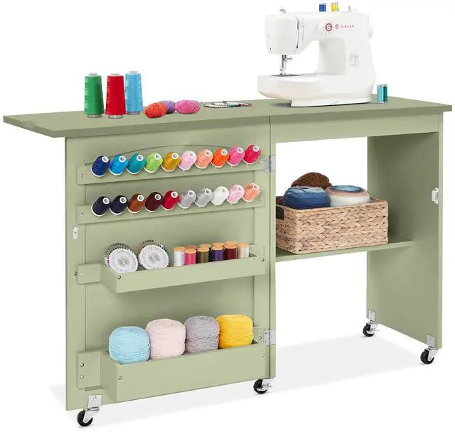 Main image of Folding Sewing Table Multipurpose Craft Station & Side Desk with Compact Design, Wheels, Shelves, Storage Trays, Pegs, Magnetic Doors, Metal Doorknobs - Light Green