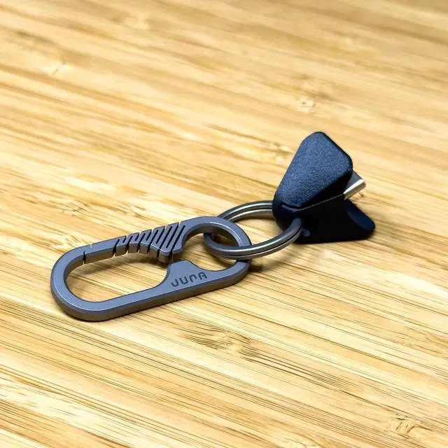 Alt view image 2 of 5 - Jura Anchor for All Apple AirPods Titanium Carabiner Clip - Black Carbon Fiber Anchor AirPods Pro 3, Pro 2, AirPods 4 & Every Generation Keychain Lanyard Attachment Lightning & USB-C Inc