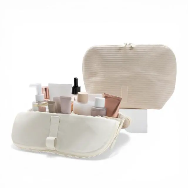 Main image of THE VERTI-Vertical Waterproof Makeup & Toiletry Bag | 23-Pocket Organizer with Upright, Fold-Down Design for Skincare, Toiletries & Essentials (Shell)