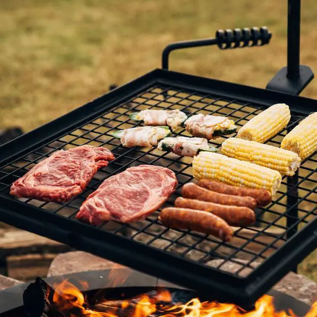 Alt view image 4 of 6 - Ash & Ember Adjustable Swivel Grill, Steel Mesh Wire Cooking Grate with Spike Pole, Open Fire Portable BBQ Camping Gear