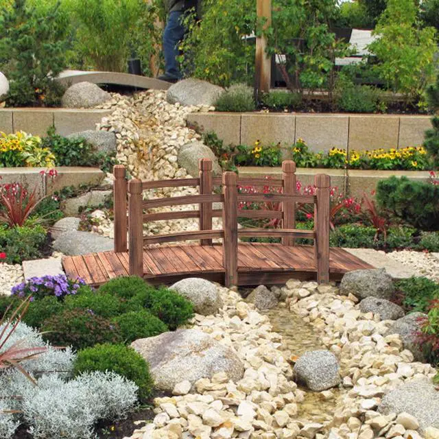 Alt view image 2 of 6 - 5 FT Wooden Garden Bridge, Stained Wood Arc Footbridge with Railings, 400 lbs Capacity, Decorative Pond Bridge for Outdoor Garden Yard Backyard Creek Farm (Brown)
