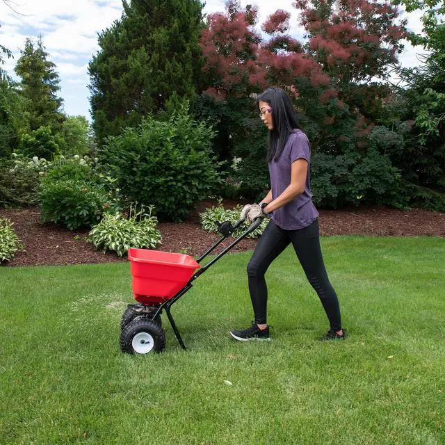 Alt view image 2 of 6 - 2050P 80lb Broadcast Spreader, Lawn Aerator, Fertilizer Spreader, 80lb Capacity, Pre-Assembled, with Rustproof Poly Hopper and Adjustable Drop Rate for Lawn Care & Seed Spreading