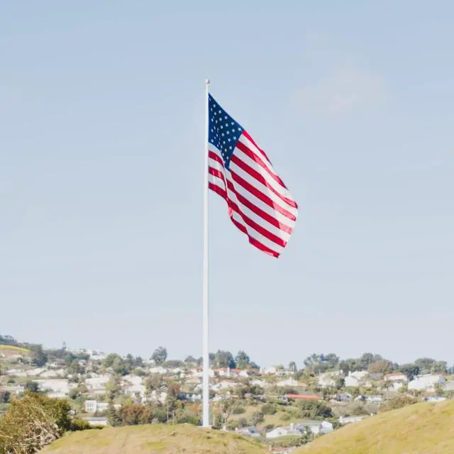 Alt view image 5 of 6 - American Flag, Made in USA, Embroidered Stars, Sewn Stripes and Brass Grommets. Fade Resistant, Heavy Duty, Long Lasting Nylon for Outdoor Durability (6x10 ft)