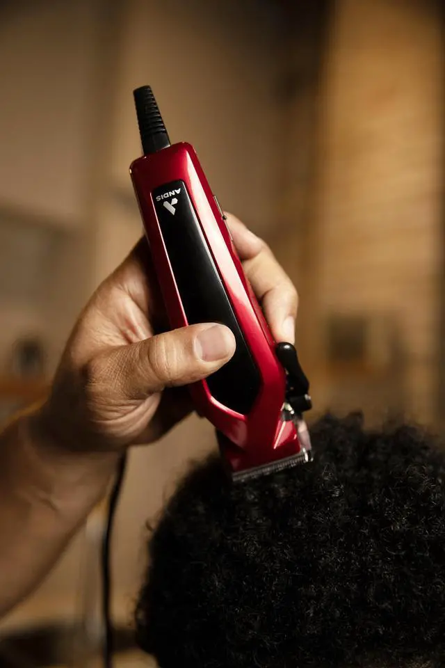 Alt view image 6 of 7 - 562940 Ultra Clip Corded Clipper & Trimmer 15-PieceHair Cutting Combo Kit, Stainless Steel Blades, Power Pivot Motor, Whisper Quiet, Hanger Loop, Red