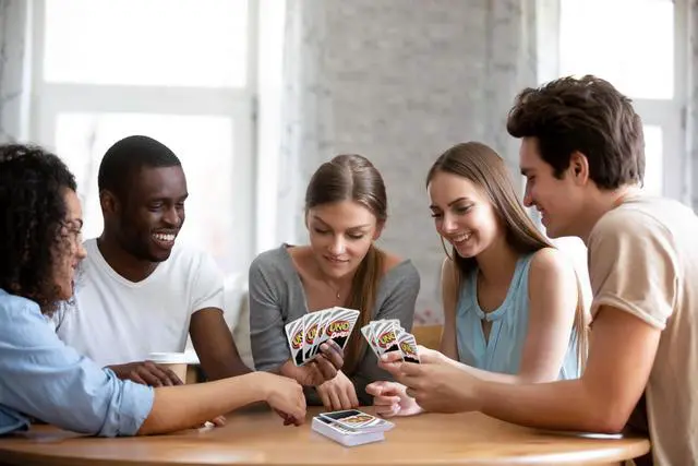 Alt view image 2 of 6 - UNO Dare Card Game for Families & Parties Featuring Challenging & Silly Dares from 3 Different Categories