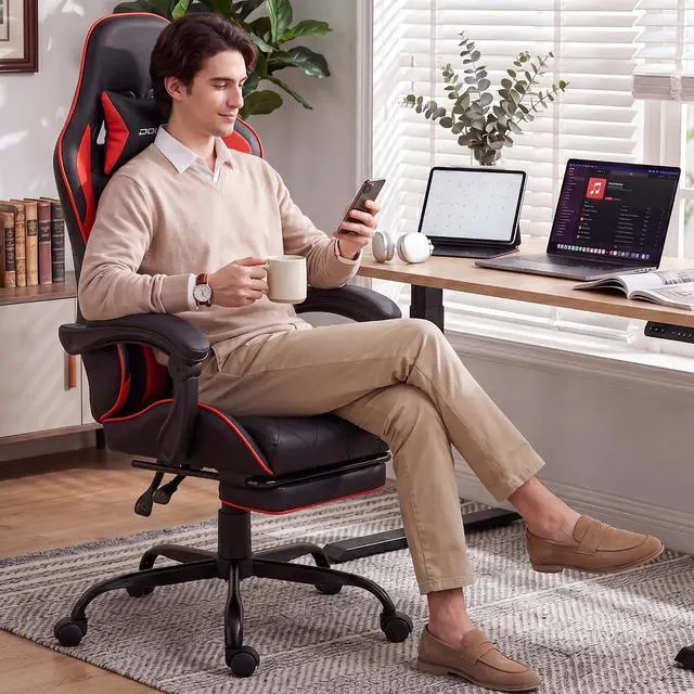 Alt view image 2 of 7 - Dowinx Gaming Chair with Footrest, Ergonomic Office Chair, Red | PU leather over high-density foam with lumbar support; steel frame holds 300 lbs; built for WFH, study, and napping