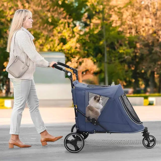 Alt view image 3 of 7 - Pet Stroller for Large Dogs, Adjustable Multi-Position Handle, Rubber Wheels, Dual Entry and Locking Rear Wheels, 3-Wheel Folding Pet Wagon for Pets up to 55 lbs, Navy Blue