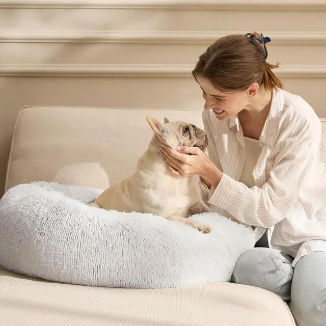 Alt view image 2 of 4 - Calming Dog Bed Medium Size Dog Donut Washable Pet Bed,30ins | Fluffy Faux Fur Round Cuddler,Machine Washable,Anti-Slip Bottom,Anti-Anxiety,Deep Sleeping for Pets Up to 45 Lbs,Frost Grey
