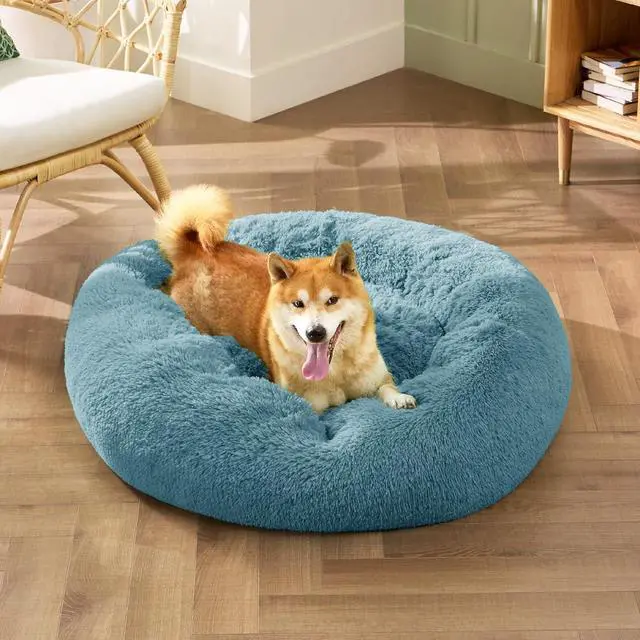 Alt view image 4 of 6 - Calming Dog Bed Medium Size Dog Donut Washable Pet Bed,30ins | Fluffy Faux Fur Round Cuddler,Machine Washable,Anti-Slip Bottom,Anti-Anxiety,Deep Sleeping for Pets Up to 45 Lbs,Washed Blue