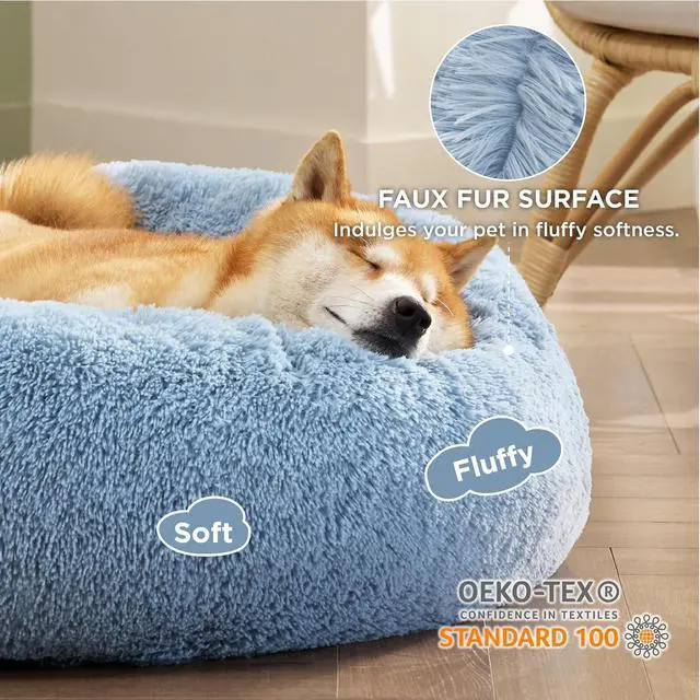 Alt view image 2 of 6 - Calming Dog Bed Medium Size Dog Donut Washable Pet Bed,30ins | Fluffy Faux Fur Round Cuddler,Machine Washable,Anti-Slip Bottom,Anti-Anxiety,Deep Sleeping for Pets Up to 45 Lbs,Light Blue