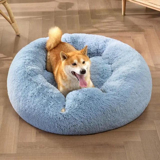 Alt view image 4 of 6 - Calming Dog Bed Medium Size Dog Donut Washable Pet Bed,30ins | Fluffy Faux Fur Round Cuddler,Machine Washable,Anti-Slip Bottom,Anti-Anxiety,Deep Sleeping for Pets Up to 45 Lbs,Light Blue