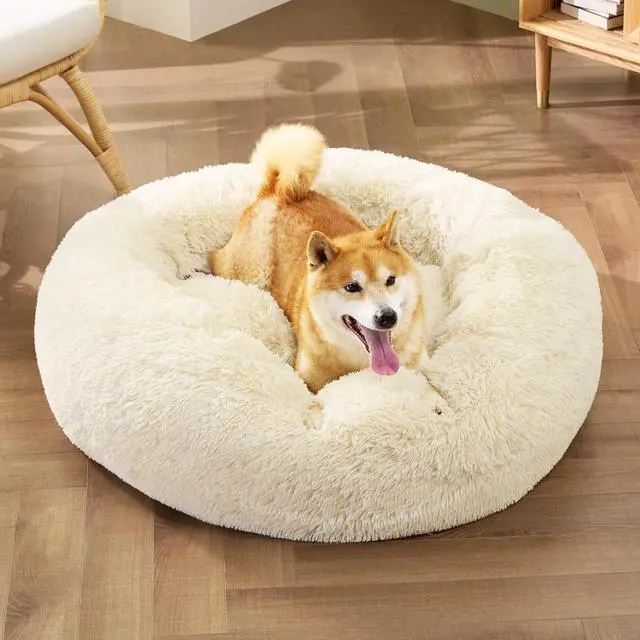 Alt view image 4 of 7 - Calming Dog Bed Medium Size Dog Donut Washable Pet Bed,30ins | Fluffy Faux Fur Round Cuddler,Machine Washable,Anti-Slip Bottom,Anti-Anxiety,Deep Sleeping for Pets Up to 45 Lbs,Ivory Beige