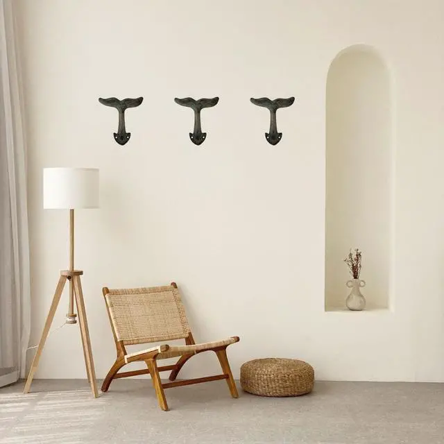 Alt view image 6 of 6 - Rustic Green Patina Cast Iron Whale Tail Wall Hooks, 4 1/2 Inches, Set of 3