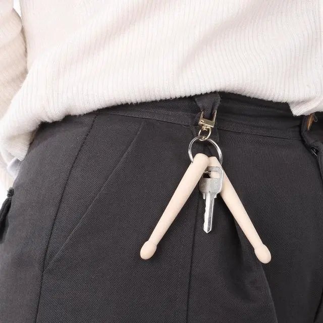 Alt view image 6 of 7 - Mini Drum Sticks Keychain, Wooden Drum Keys for Tuning Drums Mini Drumstick Gear Decoration Percussion Key Ring for Men Women Drummer and Band Gear