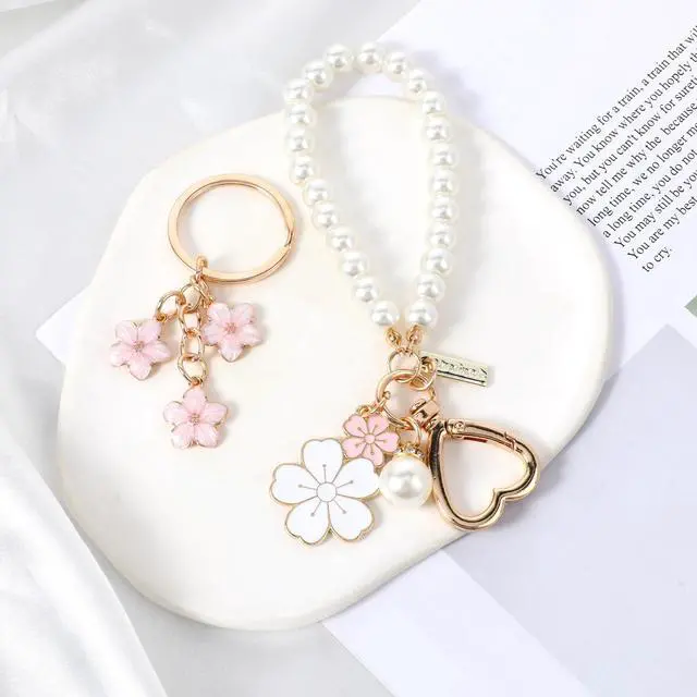 Alt view image 4 of 7 - 2 Pcs Cute Pearl Keychains for Women, Flower Keychain Kit Imitation Pearl Chain Key Chain Golden Car Key Chain Flower Keychain Charm for Girls Purse Bag Accessories