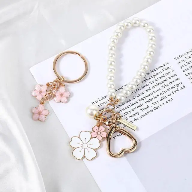 Alt view image 7 of 7 - 2 Pcs Cute Pearl Keychains for Women, Flower Keychain Kit Imitation Pearl Chain Key Chain Golden Car Key Chain Flower Keychain Charm for Girls Purse Bag Accessories