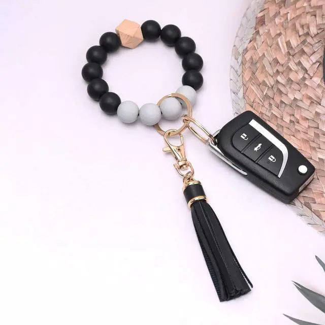 Alt view image 3 of 6 - Women Silicone Keychain Bracelet Beaded Wristlet Key Ring Black Bangle Chains with Leather Tassel
