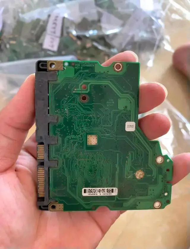 Main image of Circuit board hard disk board number 100466824 REV C