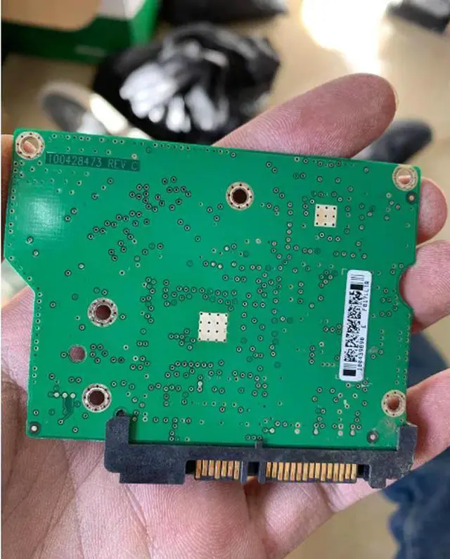 Main image of Hard disk circuit board 100428473 REV C white el 100439890