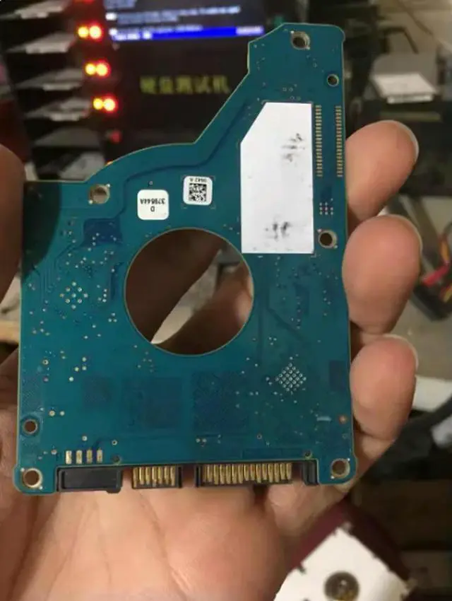 Main image of Circuit board hard disk board number 100740643 REV A