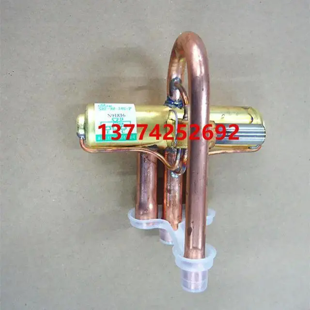 Main image of four-way valve body for Daikin RY125DQY3C air conditioner four-way valve body STF-0404Z