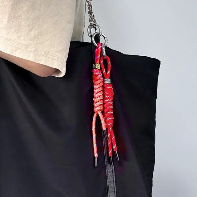 Alt view image 3 of 5 - 2mm Reflective Thin Paracord Rope - 65ft Dyneema Guy Lines for Tent, Tarp, Camping, Kite, Fluorescent Micro Paracord (Red, 65 Feet)