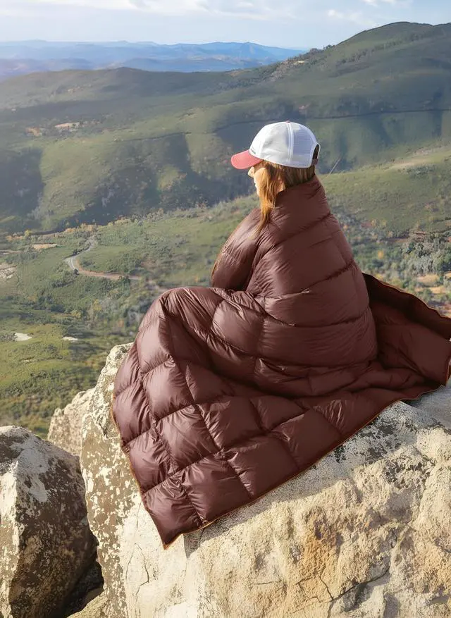 Alt view image 3 of 6 - Get Out Gear Down Camping Blanket - Puffy, Packable, Lightweight and Warm | Ideal for Outdoors, Travel, Stadium, Festivals, Beach, Hammock | 650 Fill Power Water-Resistant Backpacking Quilt