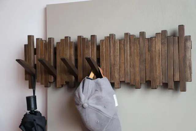 Alt view image 3 of 6 - GOGREEBELL Natural Wood Wall Mounted Piano Coat Rack| Coat Rack Wall Mount| Flip Down Wall Hook Rack 7 Hooks| Entryway Wall Art Hook,Made of Acacia Wood (Wood Wax Oil Dyed Walnut Color).Wall Art