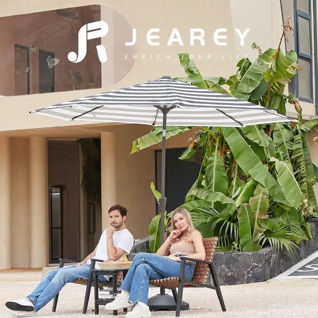 Alt view image 6 of 7 - JEAREY 9FT Outdoor Patio Umbrella Outdoor Table Umbrella with Push Button Tilt and Crank, Market Umbrella 8 Sturdy Ribs UV Protection Waterproof for Garden, Deck, Backyard, Pool (Black & White Stripe)