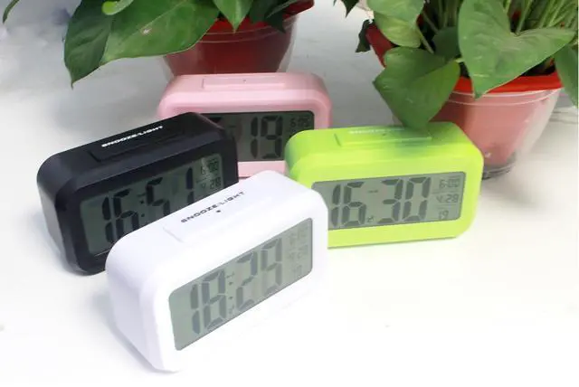 Alt view image 6 of 6 - Digital Alarm Clock with LCD Display, Desk Smart Electronic Small Clock with Indoor Temperature, Date, Light Sensor, Backlight, Battery Operated, for Home Bedroom Kids Office (Pink)
