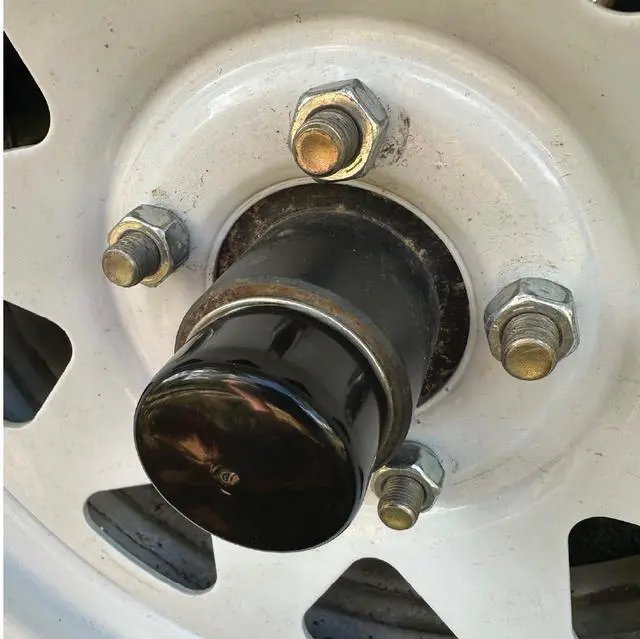 Alt view image 2 of 5 - 2-Inch Rubber Wheel Hub Trailer Bearing Dust Cap Plug Grease Cover (4 Pack)