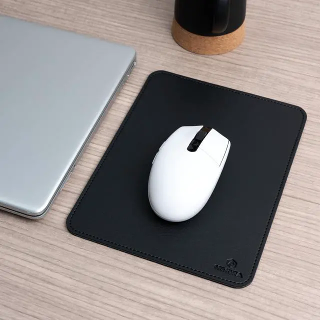 Main image of : Faux Leather Mouse Pad Elegant & Waterproof | Synthetic Leather, Non-Slip Rubber Base, Stitched Edges | Ideal for Laptop, Office (Black, 7 x 9 Inches)