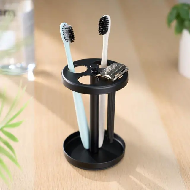 Main image of Black Stainless Toothbrush Holder Stand: Rustproof Bathroom Countertop Organizer, 4 Ventilated Slots Hold Manual Toothbrushes, Razor