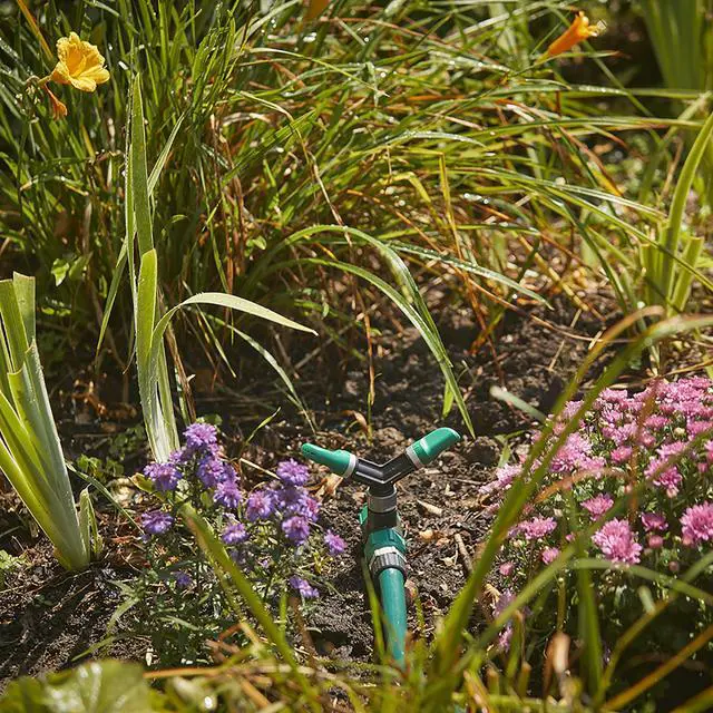 Alt view image 5 of 5 - Adjustable Spinning Sprinkler with Spike Base, Whirling Sprinkler Head for 360 Degree Coverage in Flower Beds and Vegetable Gardens